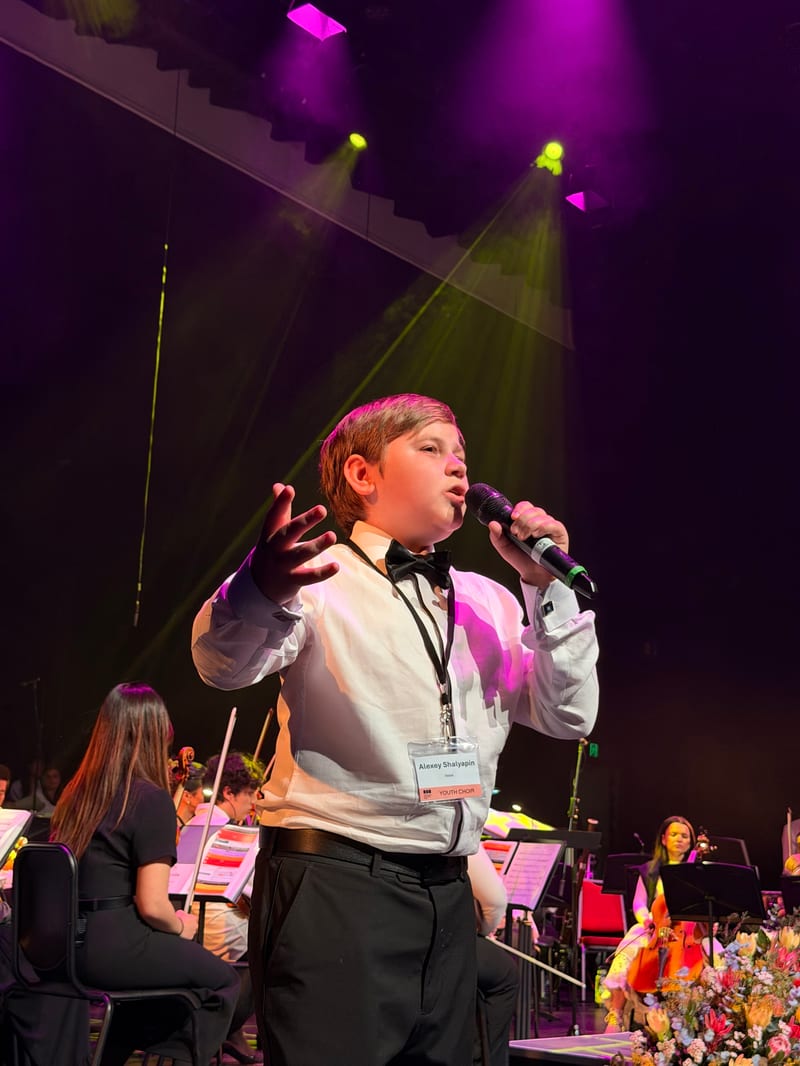 A youth vocal soloist in full voice at the Australian Christian Proms, Sydney.